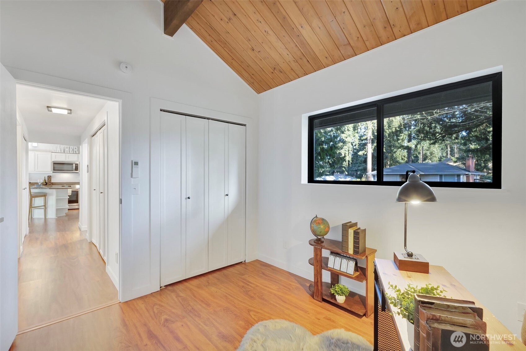 144 Amherst Street Fircrest, WA 98466 - Photo 24 of 39 a view of a workspace with furniture and a window
