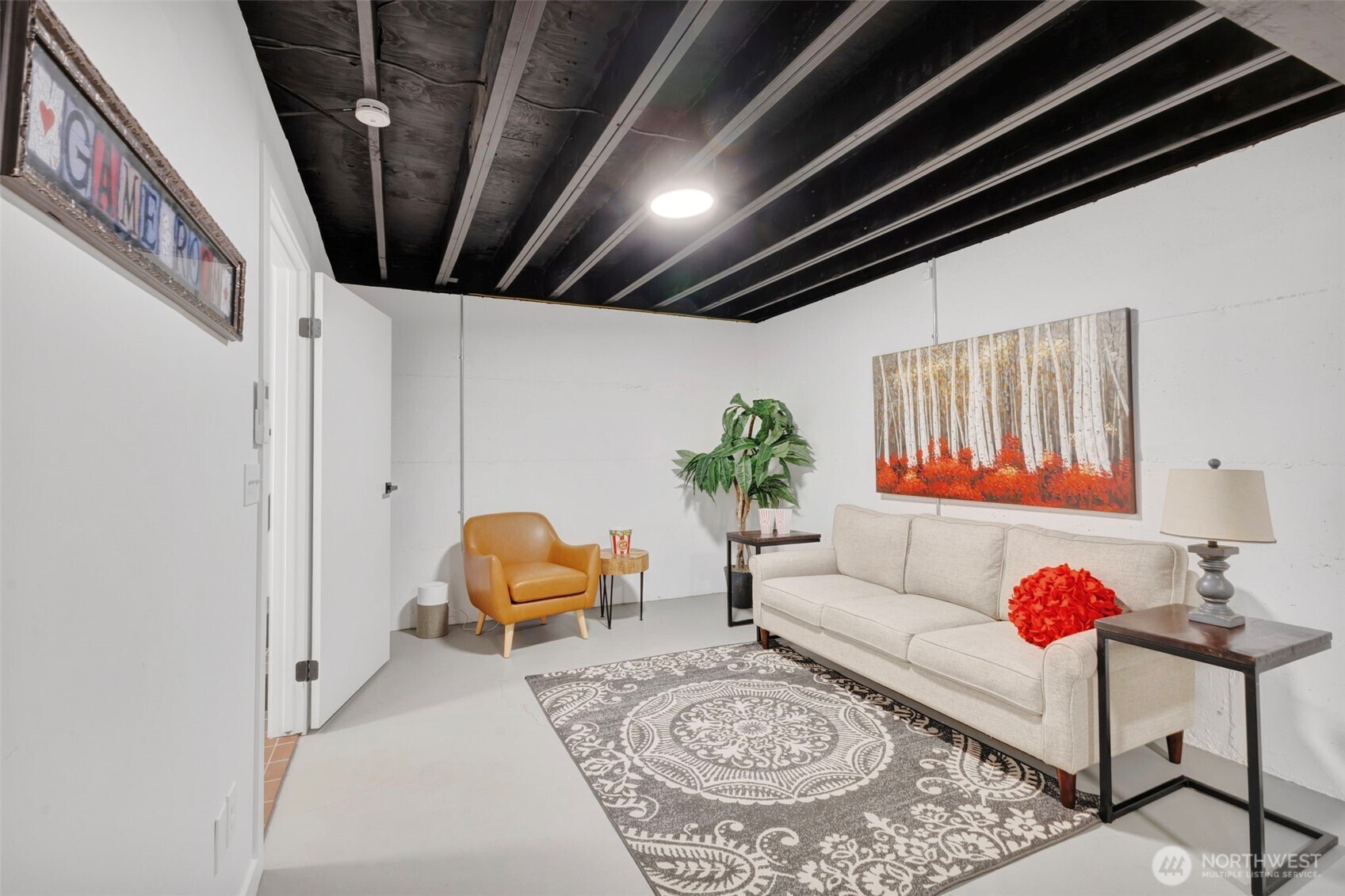 144 Amherst Street Fircrest, WA 98466 - Photo 27 of 39 a living room with furniture and a potted plant