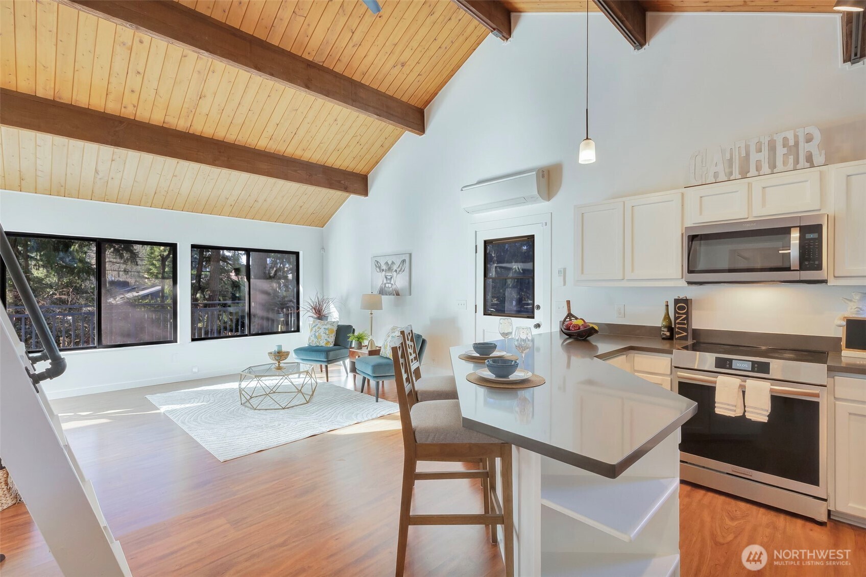 144 Amherst Street Fircrest, WA 98466 - Photo 6 of 39 a kitchen with a stove a sink and a refrigerator