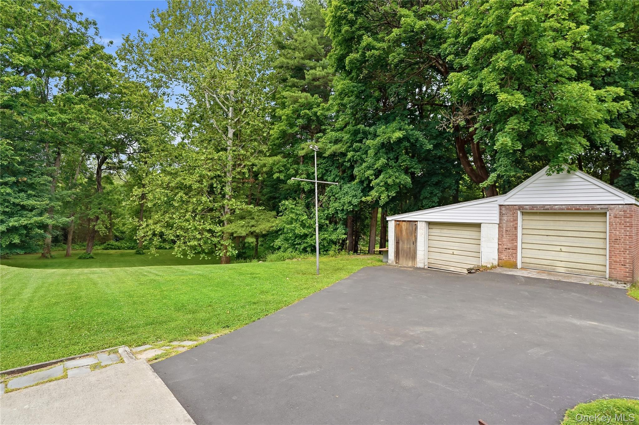 28 Kent Road Wappingers Falls, NY 12590 - Photo 6 of 50 2 car detached garage. Driveway sealed 2025.