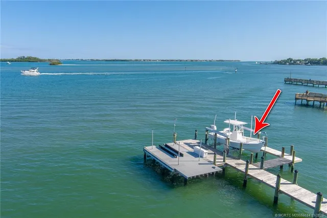 a view of a swimming pool and lounge chair