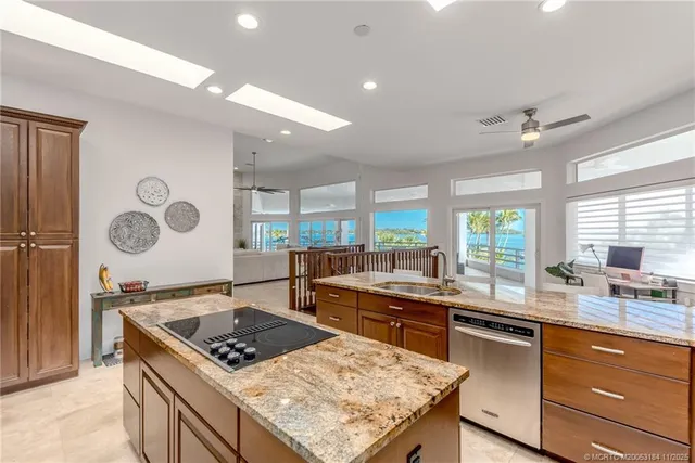 a spacious bathroom with a double vanity sink and a mirror
