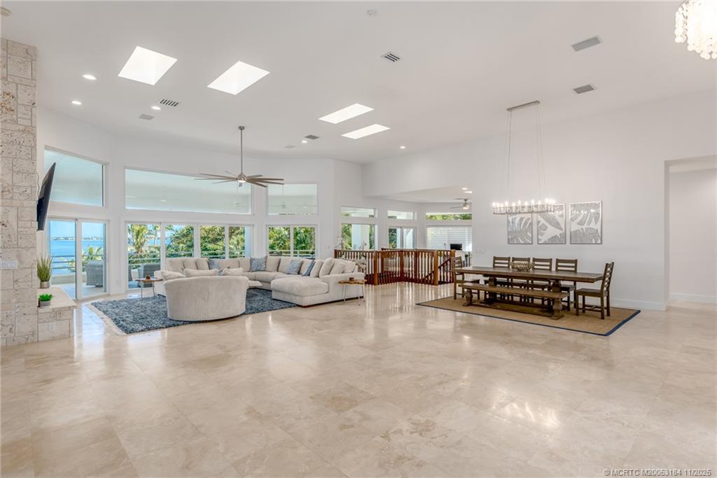 3365 Southeast St Lucie Boulevard Stuart, FL 34997 - Photo 35 of 94 a living room with furniture and a large window