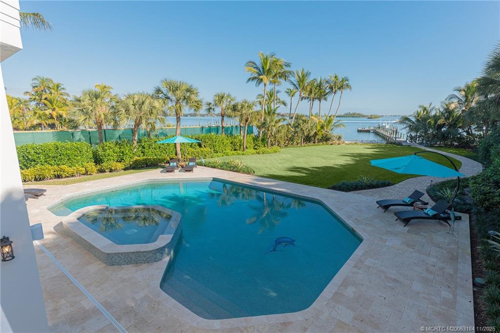 3365 Southeast St Lucie Boulevard Stuart, FL 34997 - Photo 52 of 94 a view of a backyard with outdoor space
