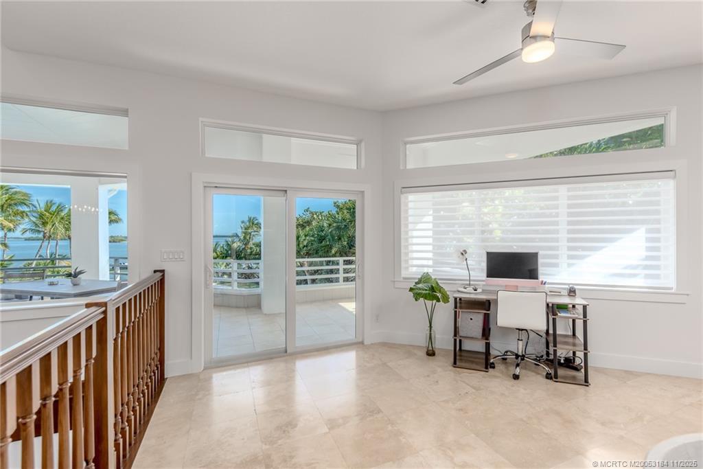 3365 Southeast St Lucie Boulevard Stuart, FL 34997 - Photo 68 of 94 a view of a workspace with furniture and a window