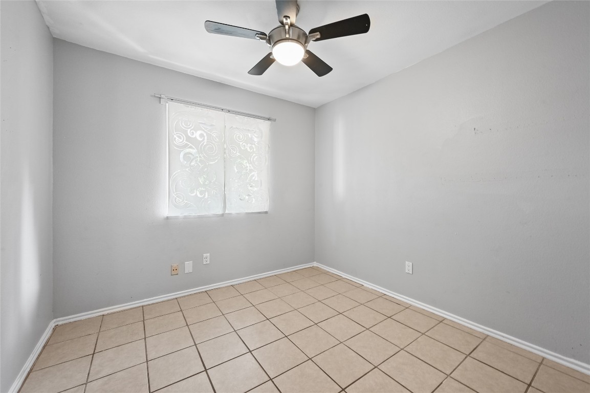 5304 China Berry Road Austin, TX 78744 - Photo 17 of 24 a view of an empty room and window