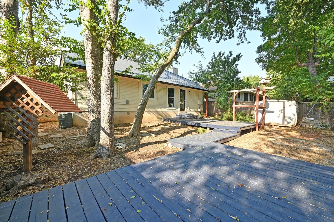 5304 China Berry Road Austin, TX 78744 - Photo 22 of 24 a view of a house with backyard and sitting area