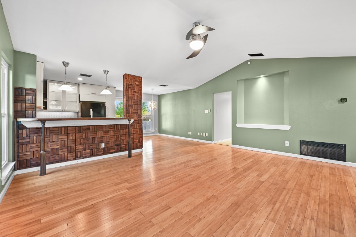 5304 China Berry Road Austin, TX 78744 - Photo 6 of 24 a spacious bathroom with a sink and a mirror