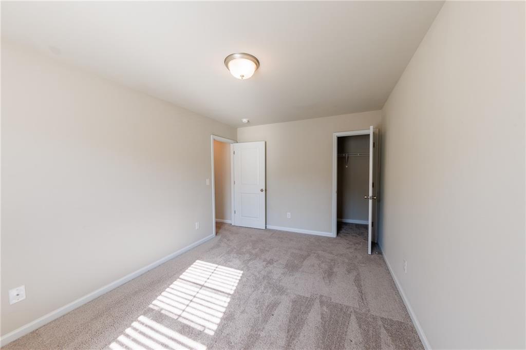 3375 Highbury Way Lithonia, GA 30038 - Photo 16 of 21 a view of an empty room and window
