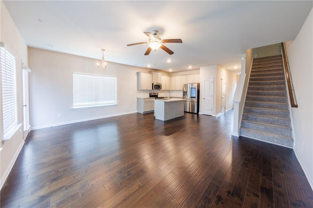 3375 Highbury Way Lithonia, GA 30038 - Photo 4 of 21 a view of a kitchen with wooden floor and a window