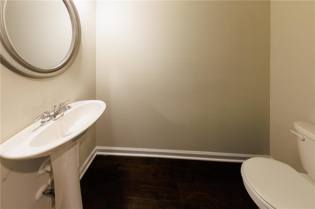 3375 Highbury Way Lithonia, GA 30038 - Photo 7 of 21 a bathroom with a sink and a mirror
