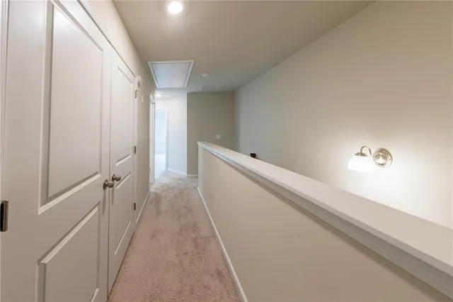 a view of a hallway with closet