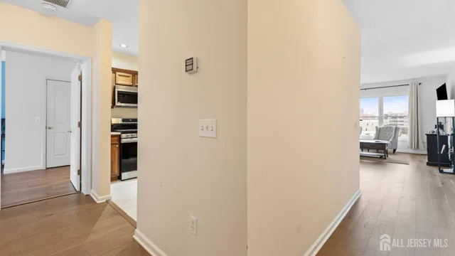 a kitchen with stainless steel appliances granite countertop a refrigerator sink and cabinets