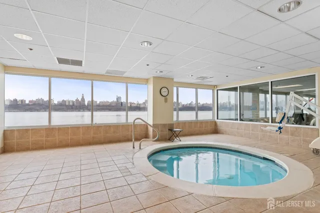 a view of a swimming pool and outdoor space