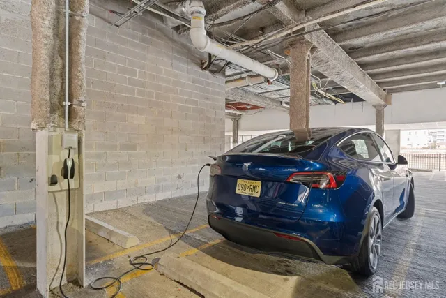 a view of a lake with tall buildings