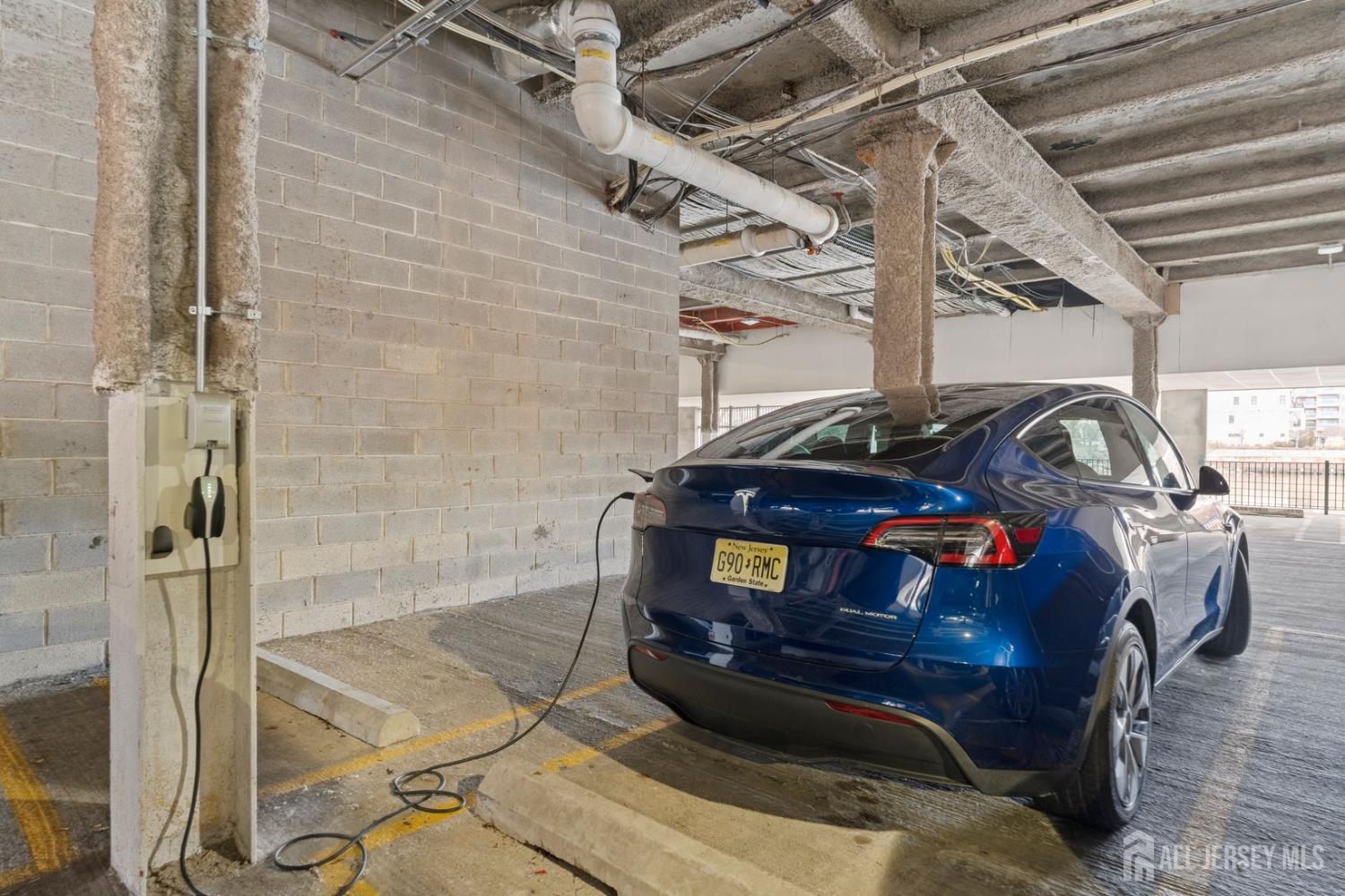 344 The Promenade Edgewater, NJ 07020 - Photo 39 of 44 a car parked in a garage