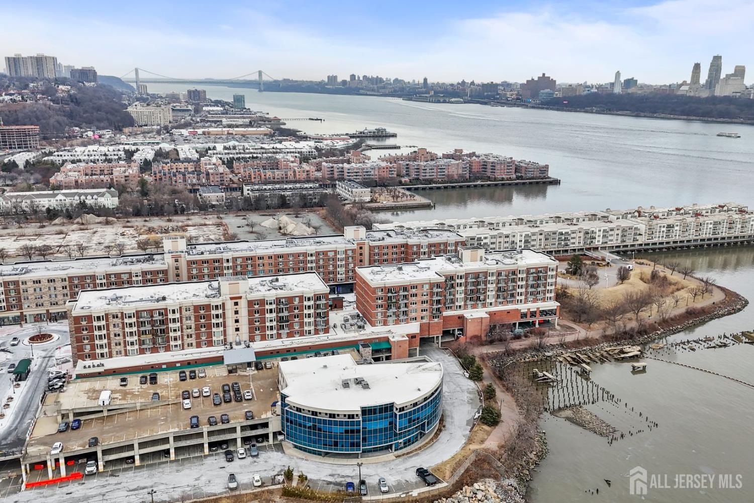 344 The Promenade Edgewater, NJ 07020 - Photo 40 of 44 a view of a lake with tall buildings