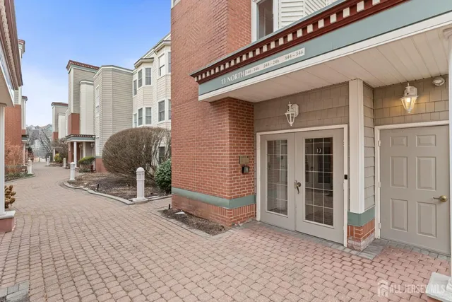 a view of a building stairs and a patio