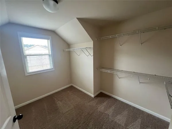 a view of a room with rack on the wall