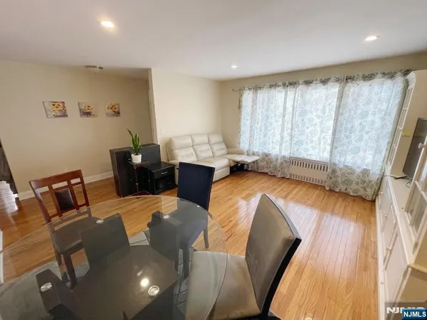 a kitchen with a refrigerator a microwave oven a sink and dishwasher