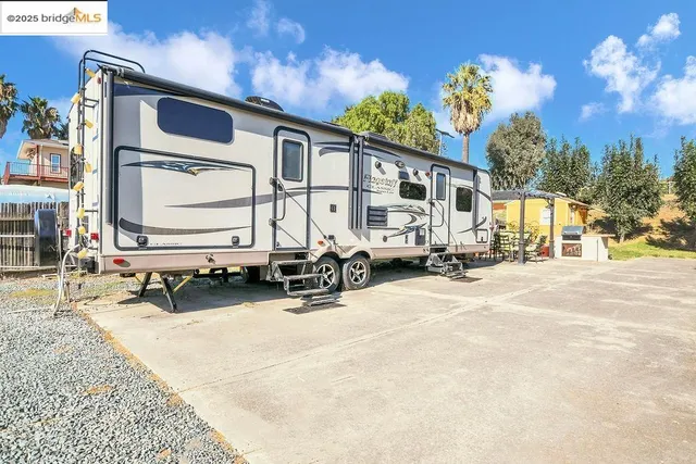 a view of a terrace with sitting area