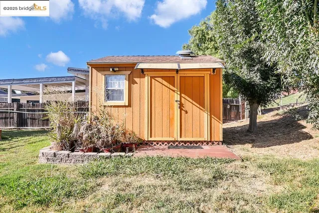 a workspace with furniture and wooden floor