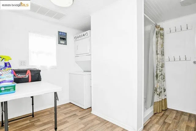 a room with furniture and wooden floor