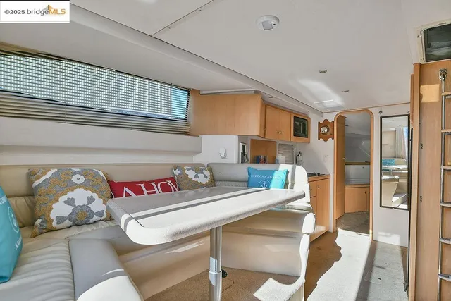 a room with a couch and wooden floor