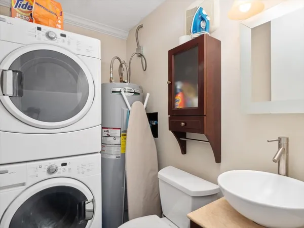 a bathroom with a toilet and a sink