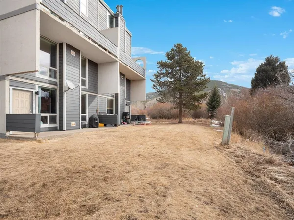 a house with trees in front of it