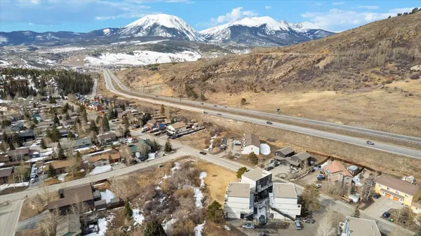 a view of mountain with yard