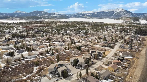 a view of a city with mountains in the background