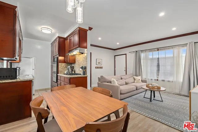 a very nice looking living room with a large window