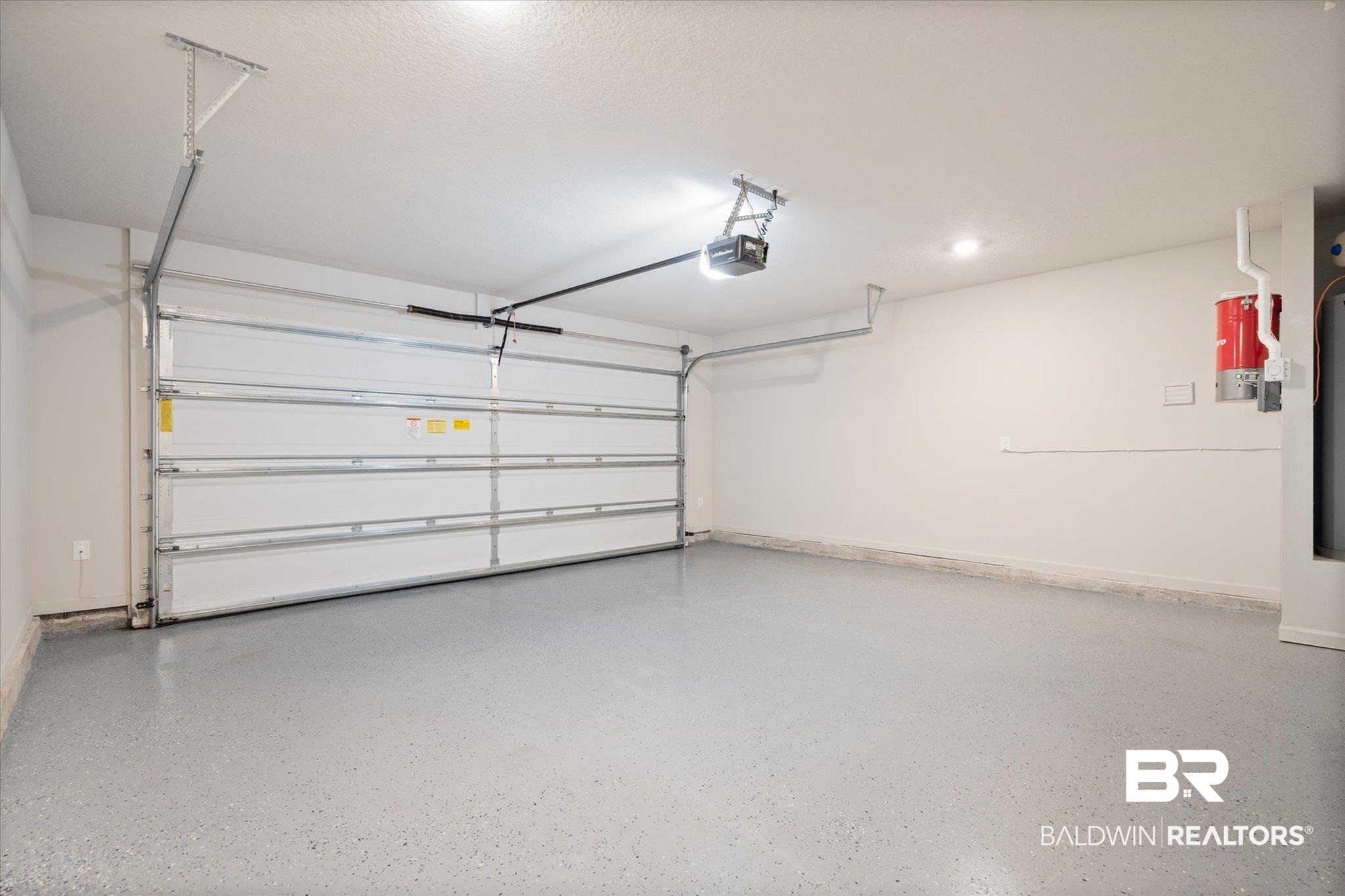 446 Paget Drive East Mobile, AL 36608 - Photo 17 of 20 Garage featuring a garage door opener
