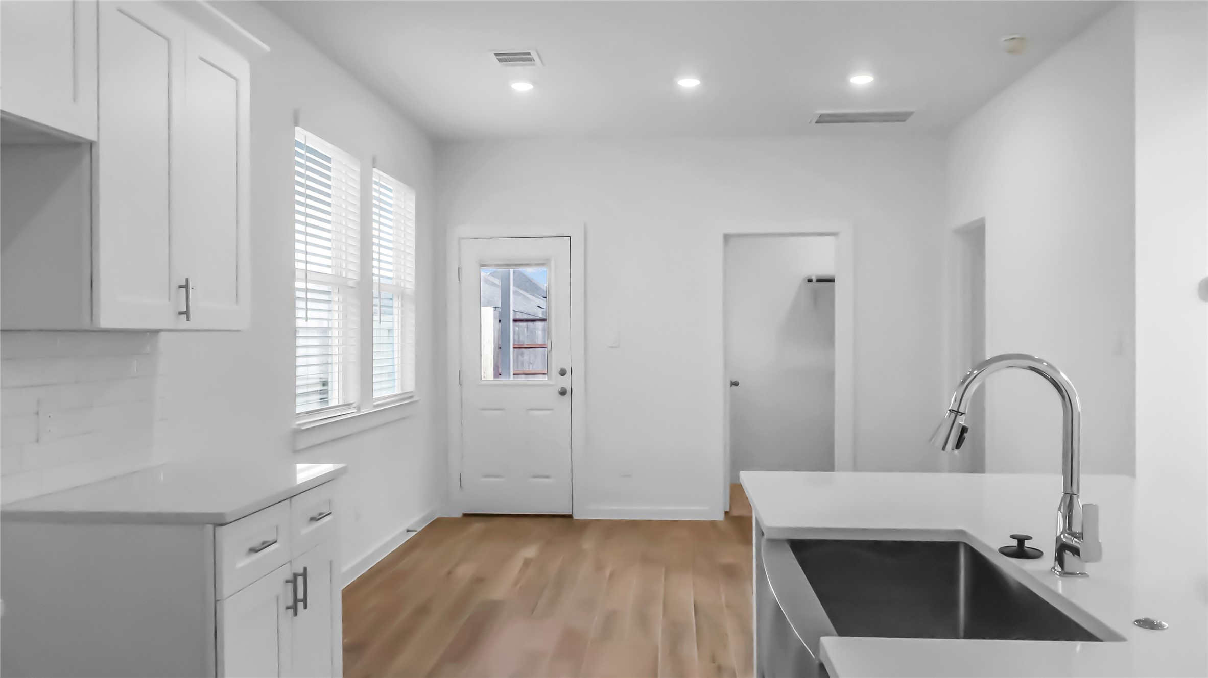 6635 Escondido Drive Rosharon, TX 77583 - Photo 13 of 28 a bedroom with a bed and a sink