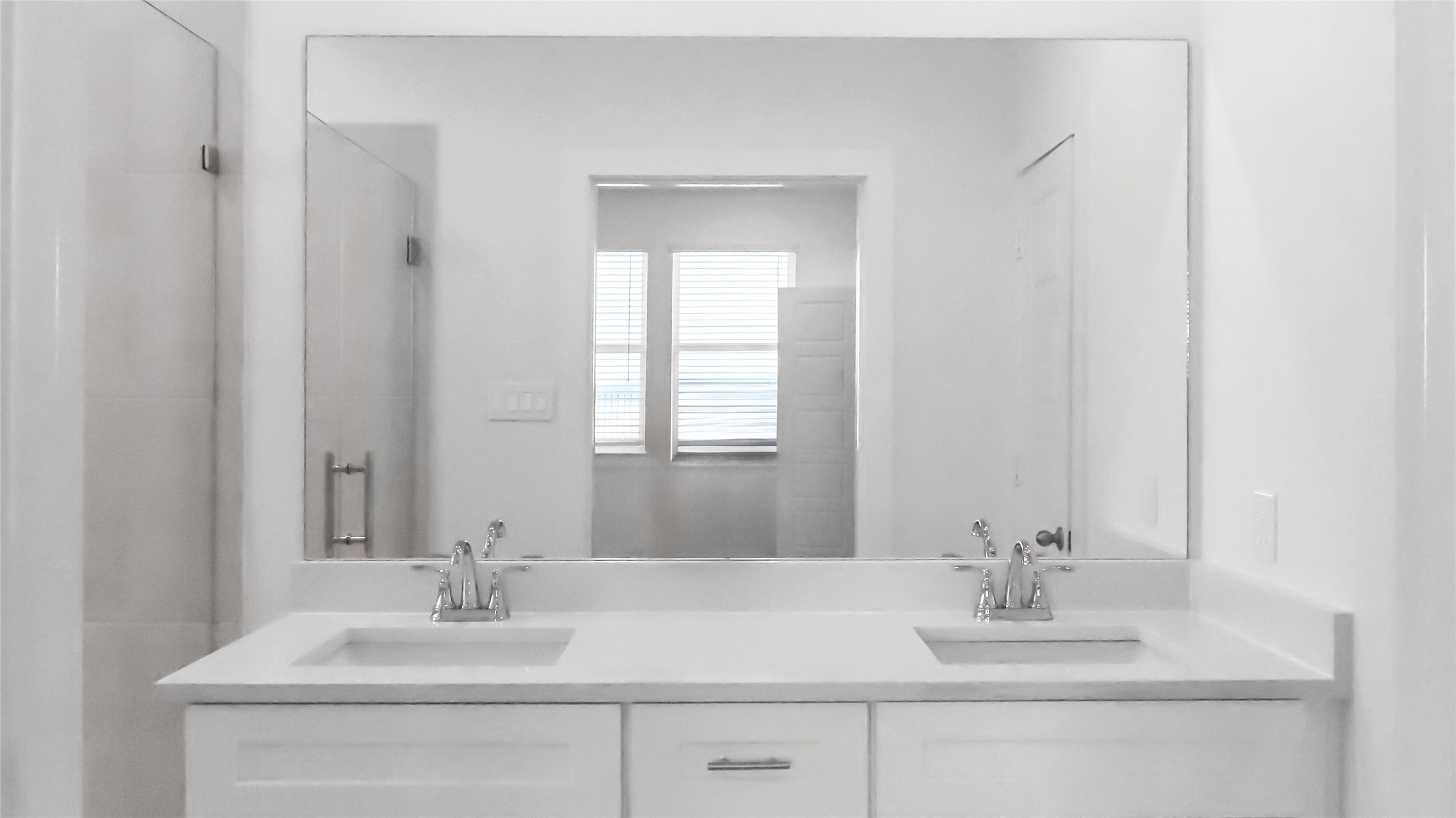 6635 Escondido Drive Rosharon, TX 77583 - Photo 18 of 28 a bathroom with a sink and a mirror