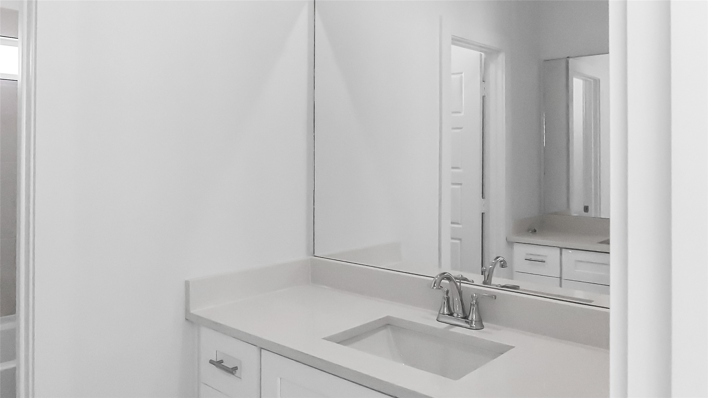 6635 Escondido Drive Rosharon, TX 77583 - Photo 27 of 28 a bathroom with a sink and a mirror