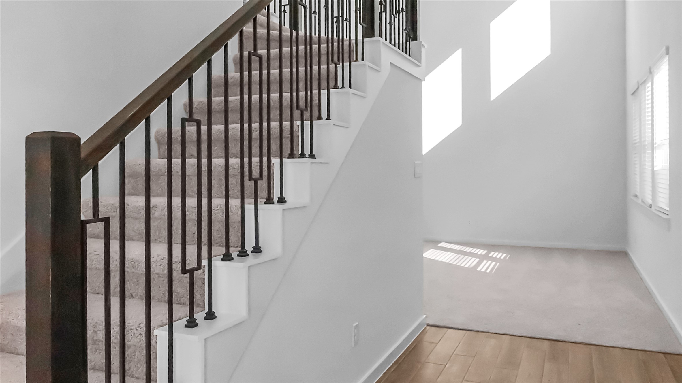 6635 Escondido Drive Rosharon, TX 77583 - Photo 5 of 28 a view of staircase with railing and a window