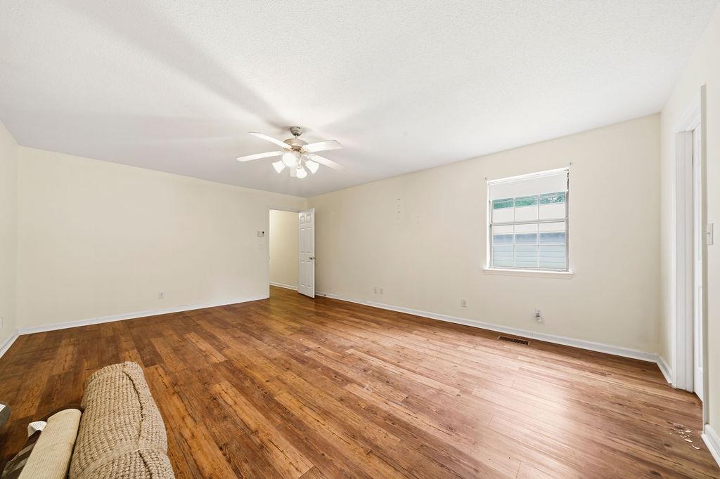 483 Allgood Road Flintstone, GA 30725 - Photo 16 of 34 a view of an empty room with wooden floor