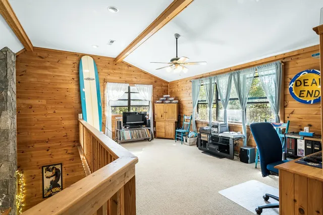 a view of a livingroom with furniture
