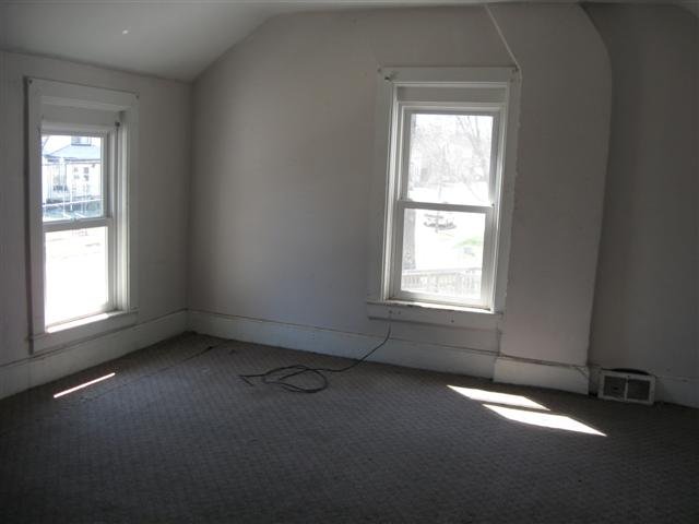 922 East Shawnee Street Freeport, IL 61032 - Photo 8 of 9 an empty room with a window
