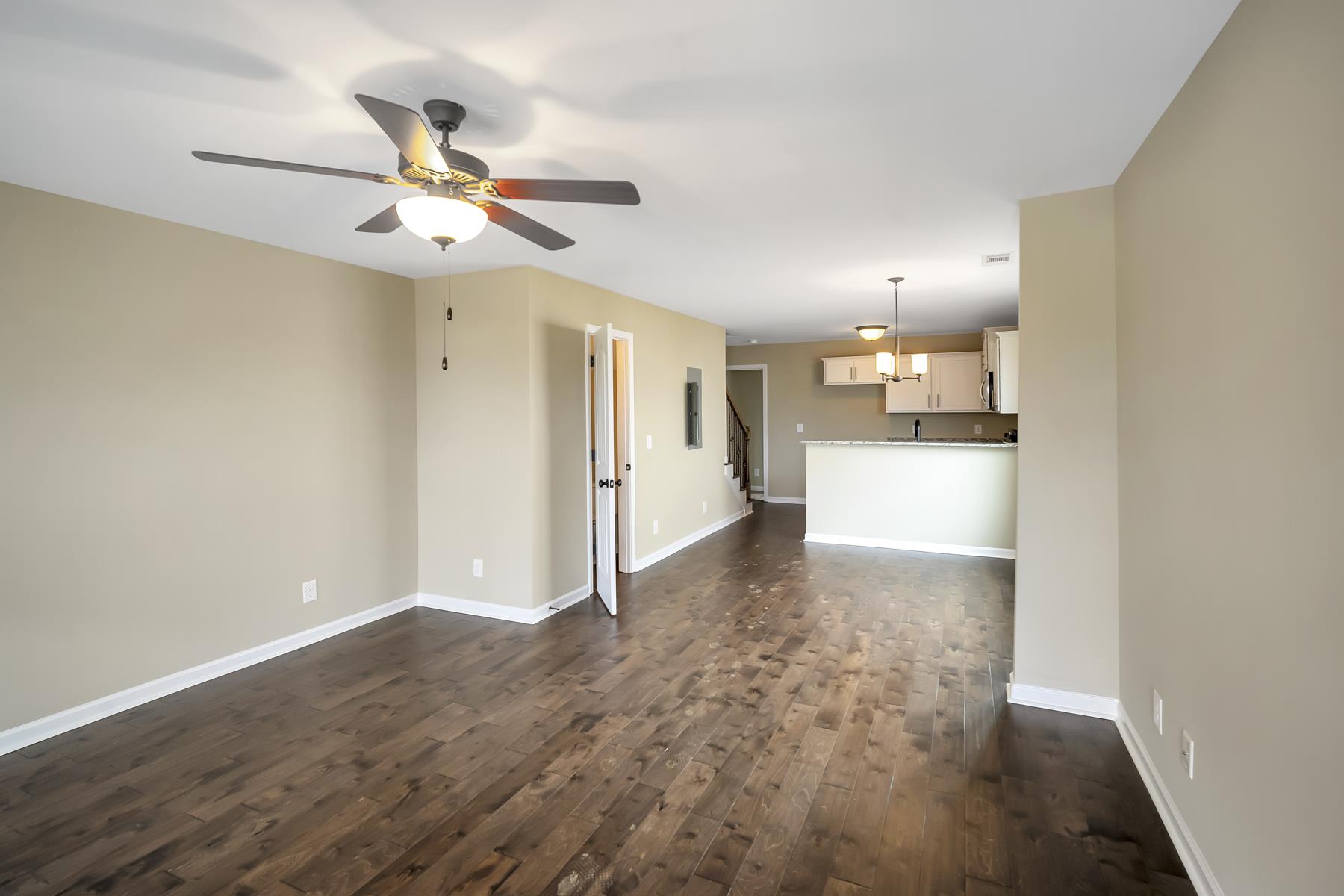 1250 B Bluebird Road Lebanon, TN 37087 - Photo 2 of 10 Wood floors in the living room and kitchen.