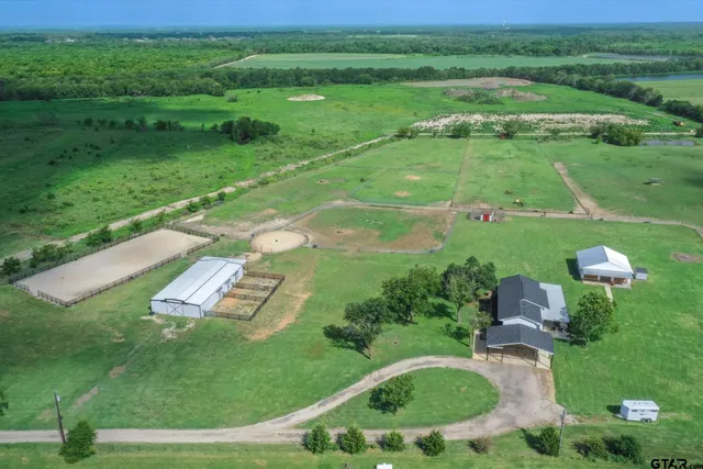 a view of a lake with a big yard