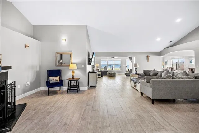 a view of a livingroom with furniture and a fireplace