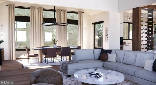 a view of a livingroom with furniture and window