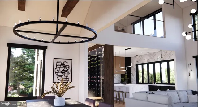 a spacious bedroom with a bed a couch and large window