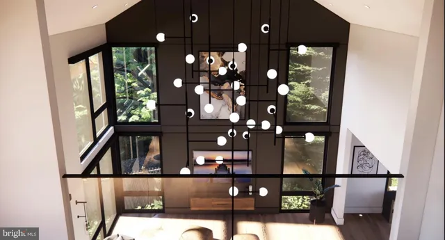 a bedroom with furniture and a large window