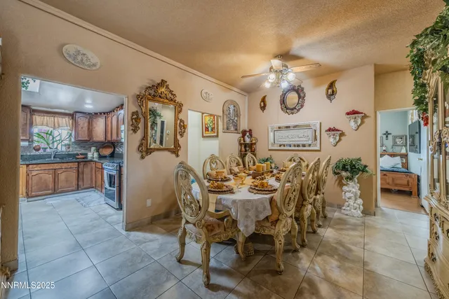 a kitchen with stainless steel appliances granite countertop wooden cabinets a stove top oven a sink and dishwasher