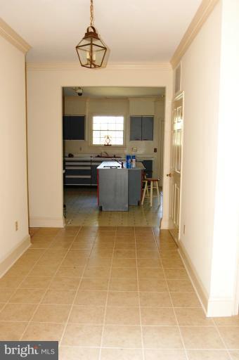 6937 Pea Neck Road St. Michaels, MD 21663 - Photo 2 of 22 a view of kitchen with furniture and window