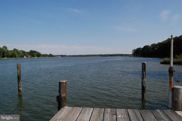 6937 Pea Neck Road St. Michaels, MD 21663 - Photo 13 of 22 a view of wooden floor with a lake